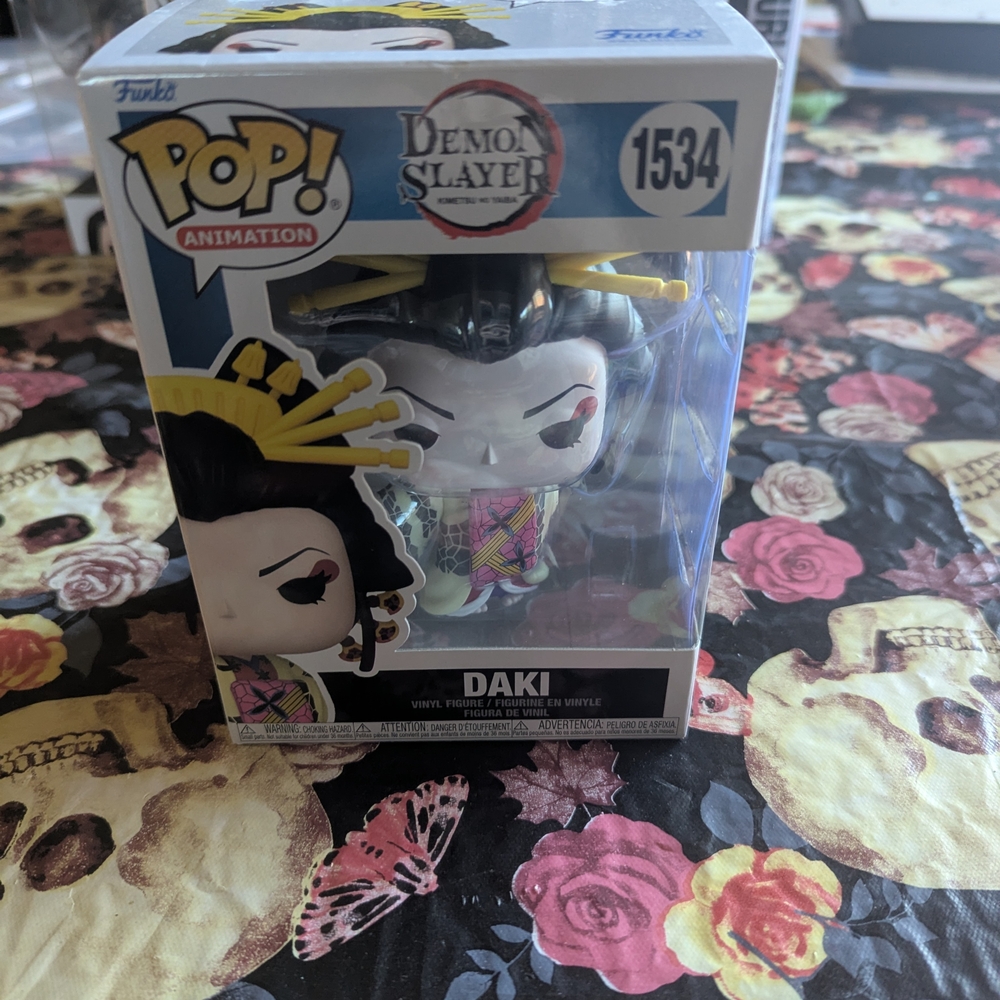 Funko Pop Animation Daki with Yellow and Black Accents